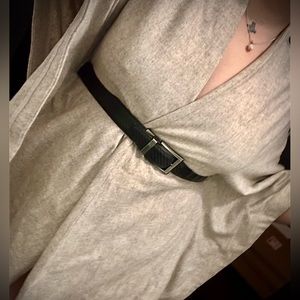 Rarely worn sophisticated and form fitting poncho